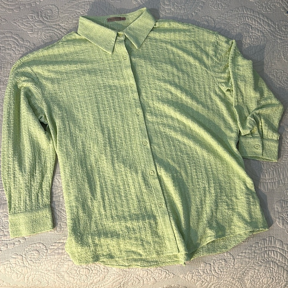 Lime green textured button-down collared top